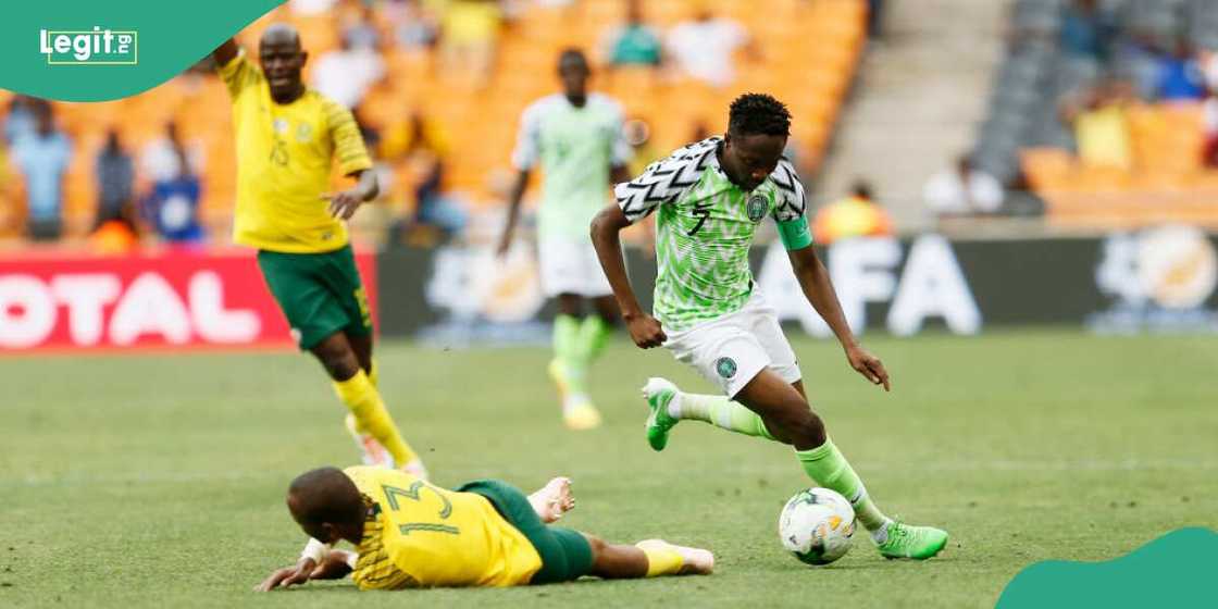 South Africa's Tiyani Mabunda is Tackled by Nigeria's Captain