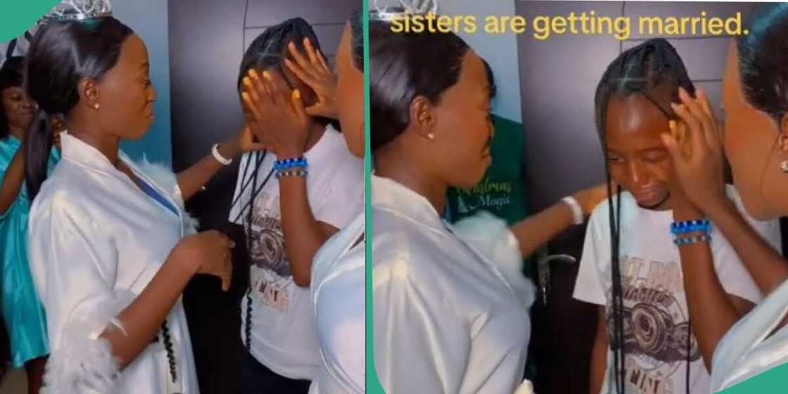 Last born cries in video as her twin sisters get married Last born cries in video as her twin sisters get married