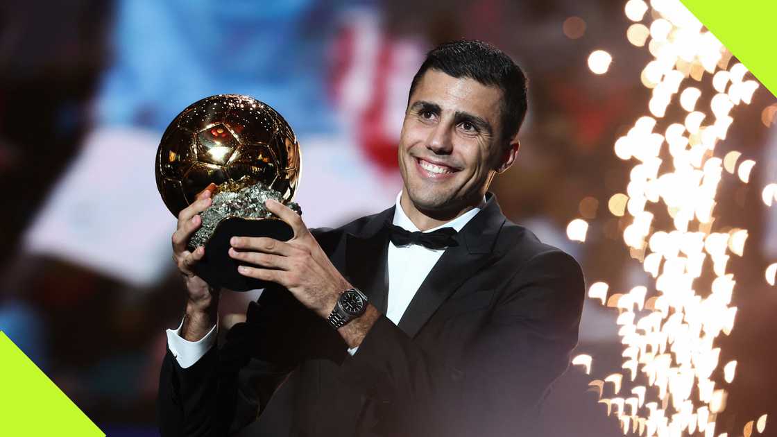 Rodri hoists his Ballon d'Or Award after he was crowned the best player on the planet at the Theatre du Chatelet in Paris. Photo by Franck Fife.