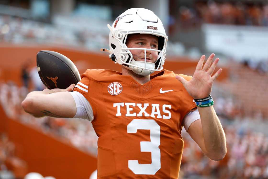 Quinn Ewers of the Texas Longhorns warms-up prior to a game