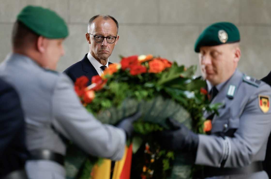 Merz said action was needed because of US wavering on European security and a hostile Russia Merz said action was needed because of US wavering on European security and a hostile Russia