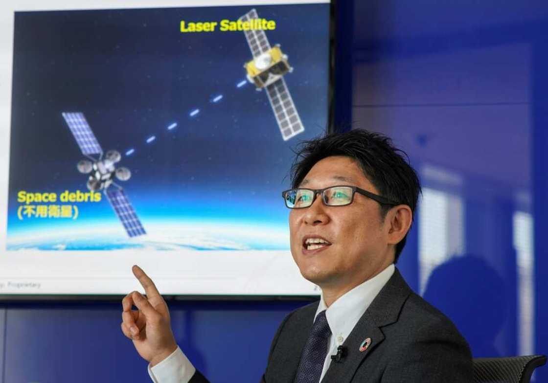Engineer Tadanori Fukushima of satellite operator SKY Perfect JSAT envisions using a laser beam to vaporise the surface of space debris Engineer Tadanori Fukushima of satellite operator SKY Perfect JSAT envisions using a laser beam to vaporise the surface of space debris