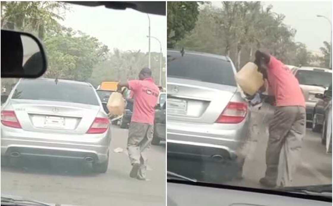 Man seen pouring fuel into a moving vehicle in Abuja as fuel scarcity in Nigeria bites harder Man seen pouring fuel into a moving vehicle in Abuja as fuel scarcity in Nigeria bites harder