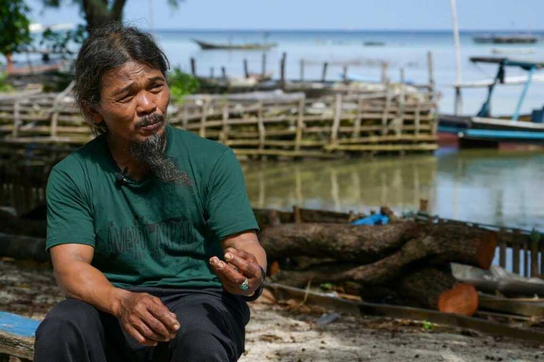 Mustagfirin is one of four Pari residents calling for Holcim to reduce its emissions Mustagfirin is one of four Pari residents calling for Holcim to reduce its emissions
