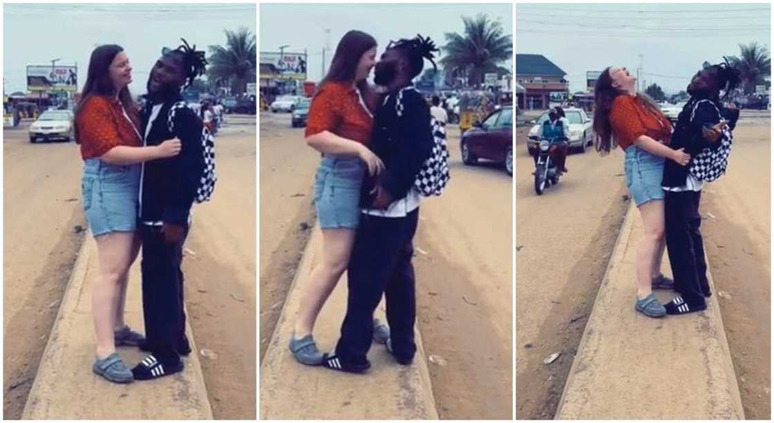 Photos of a Nigerian man and his his white lover in a public display of affection. Photos of a Nigerian man and his his white lover in a public display of affection.