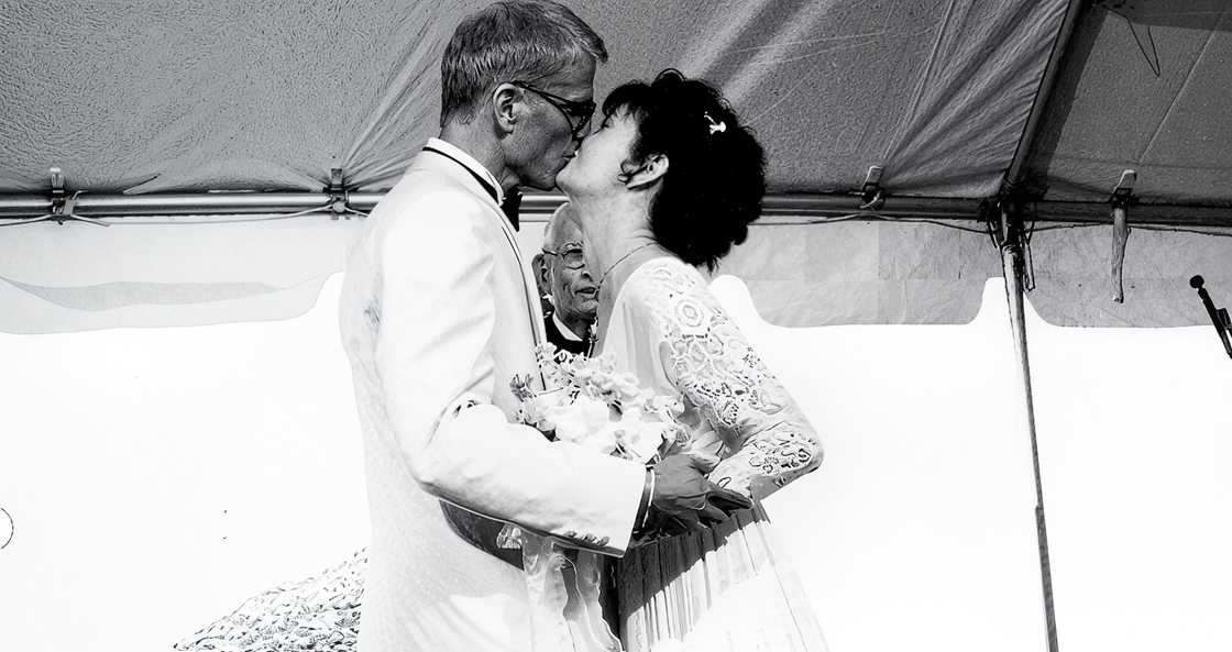 Ted Danson and Mary Steenburgen kiss during their wedding. Ted Danson and Mary Steenburgen kiss during their wedding.