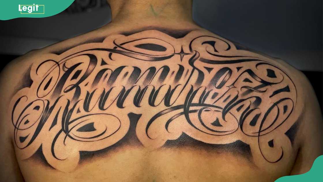 Last name back tattoo