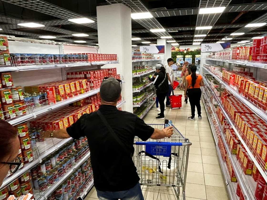 In a rare scene of plenty in Cuba, the shelves are full at a new state-owned dollar-only supermarket in Havana In a rare scene of plenty in Cuba, the shelves are full at a new state-owned dollar-only supermarket in Havana