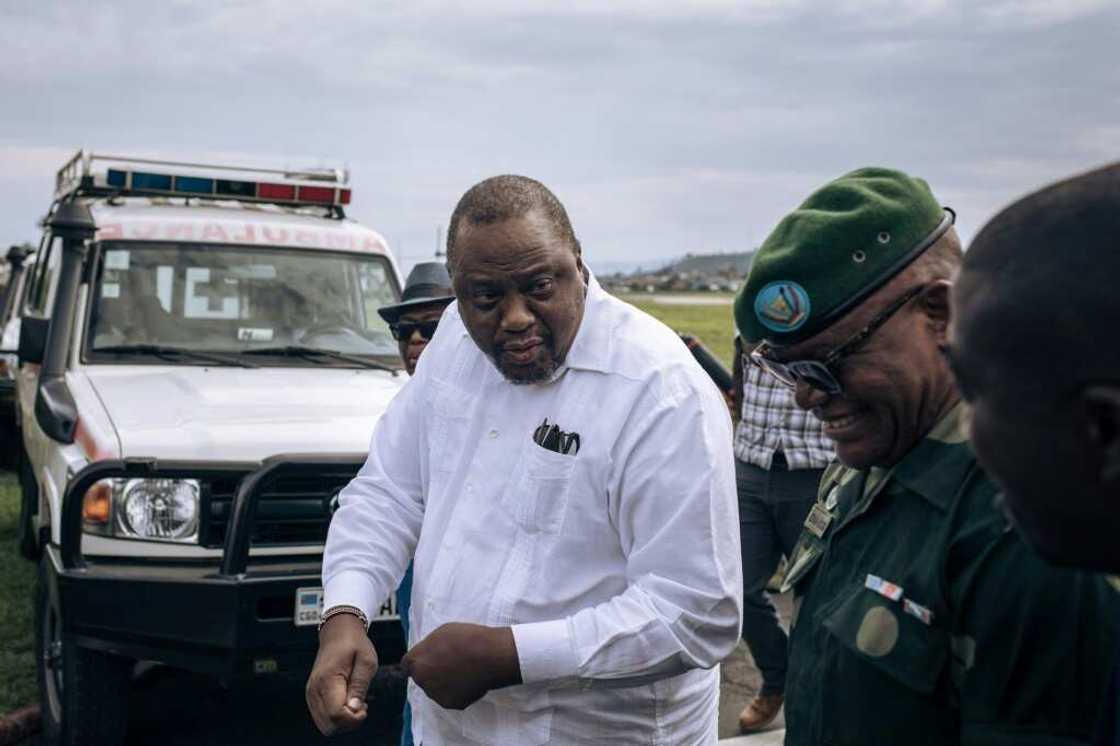Kenyatta (in white) visiting Goma this week Kenyatta (in white) visiting Goma this week
