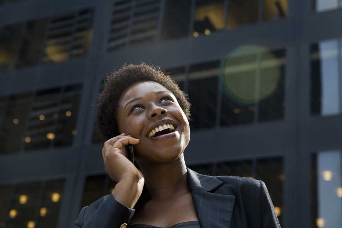 A businesslady on a phone call A businesslady on a phone call