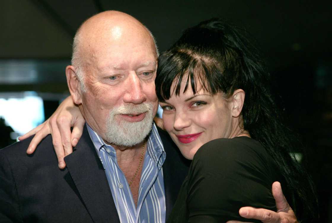 Donald P. Bellisario (L) and Pauley Perrette at a film event in California