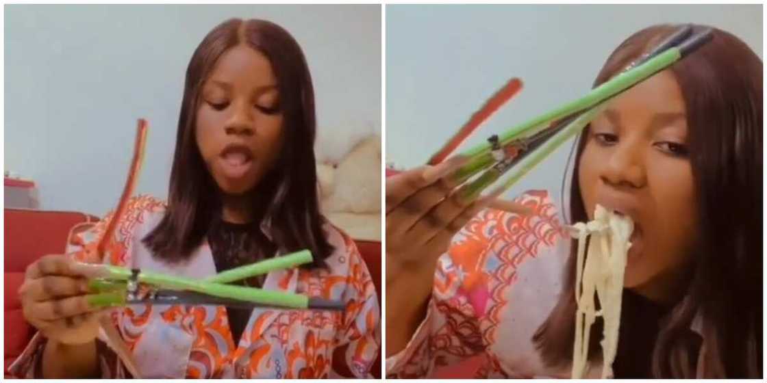 Lady eats with long nails / artificial nails Lady eats with long nails / artificial nails