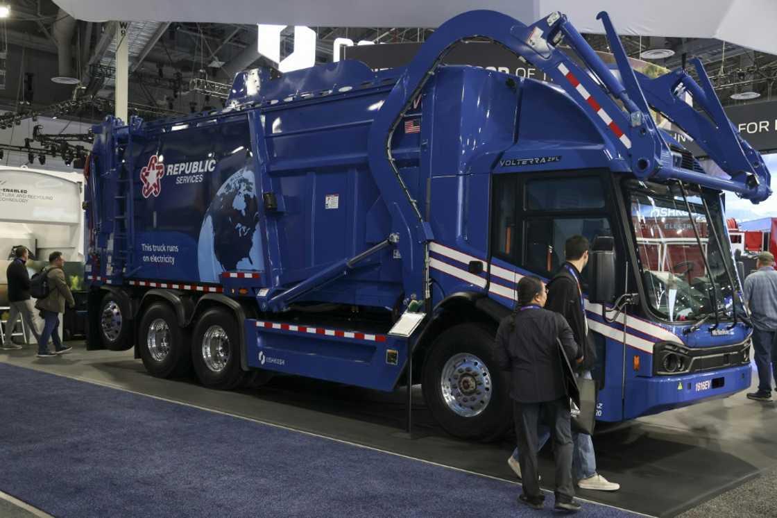 Oshkosh's all-electric garbage and recycling vehicle is outfitted with AI that can identify load hazards and tell if recycling bins have been contaminated with other refuse