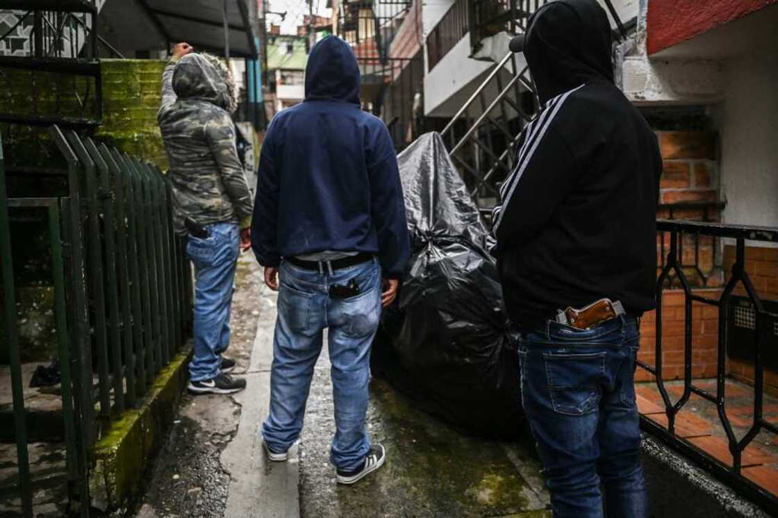 Thirty years after Escobar was shot dead on a Medellin rooftop, the drug trade still dominates many poor neighborhoods of the city Thirty years after Escobar was shot dead on a Medellin rooftop, the drug trade still dominates many poor neighborhoods of the city