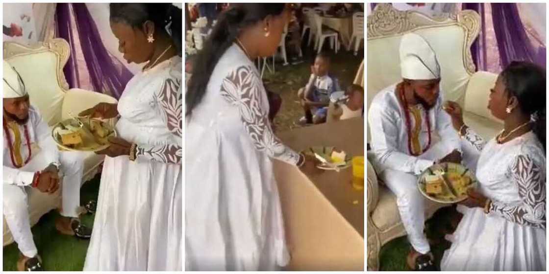 Sad-looking pregnant bride kneels to feed her groom at wedding in viral video, stirs mixed reactions Sad-looking pregnant bride kneels to feed her groom at wedding in viral video, stirs mixed reactions