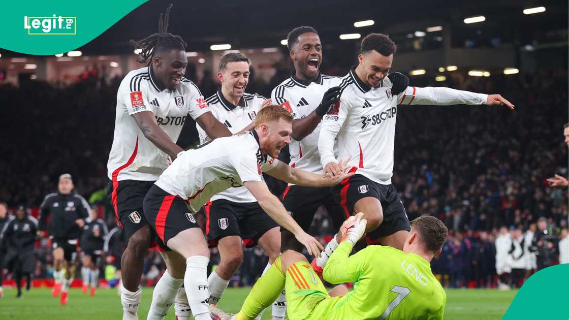 Fulham players celebrate goalkeeper Bernd Leno Fulham players celebrate goalkeeper Bernd Leno
