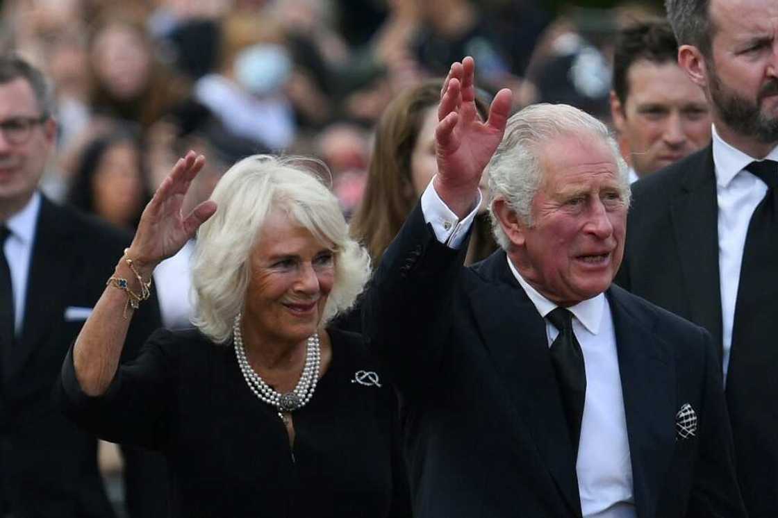 Charles and Camilla greeted the crowds as they arrived at Buckingham Palace Charles and Camilla greeted the crowds as they arrived at Buckingham Palace
