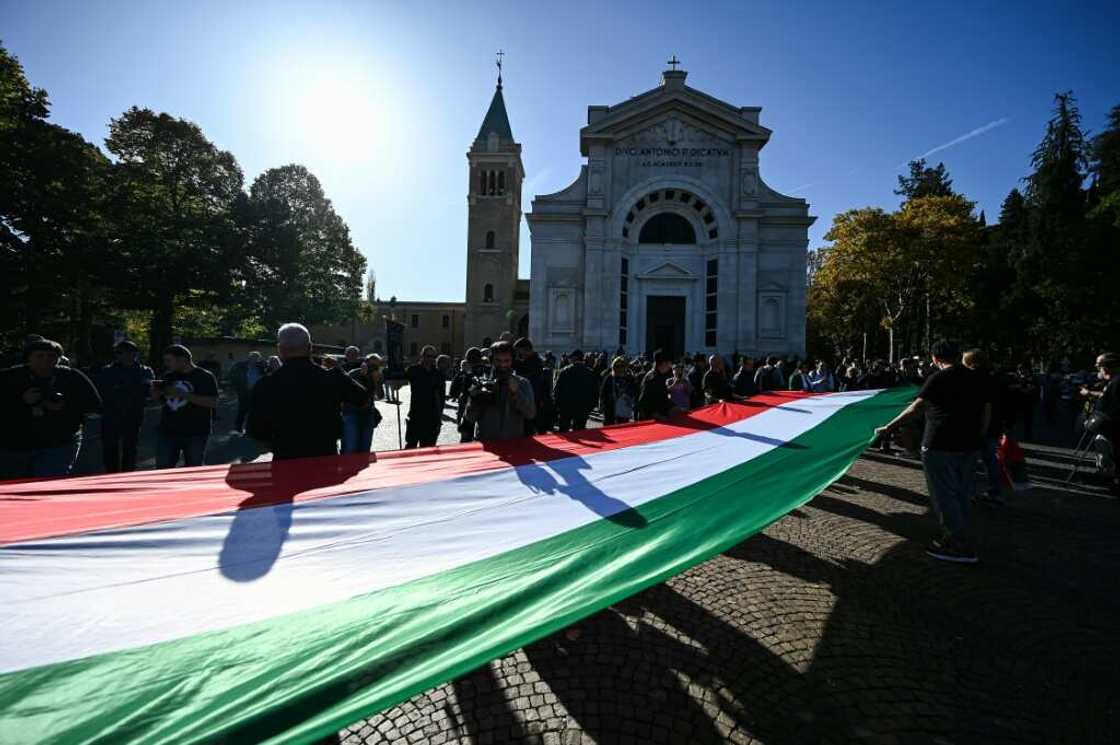 Police did not move against 2,000 people who gathered in Benito Mussolini's birth and burial place of Predappio to remember Italy's fascist dictator Police did not move against 2,000 people who gathered in Benito Mussolini's birth and burial place of Predappio to remember Italy's fascist dictator