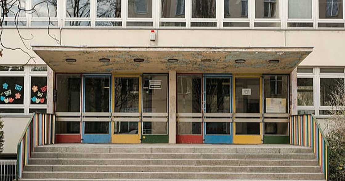 Teacher in awe after seeing a pupil singing passionately after school. Teacher in awe after seeing a pupil singing passionately after school.