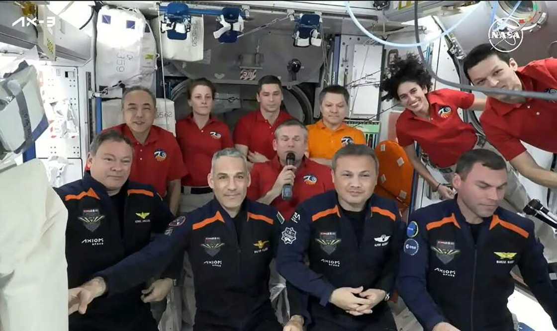 The Axiom Mission 3 (Ax-3) members (L-R, front) Commander Michael Lopez-Alegria of Spain, Pilot Walter Villadei of Italy, Mission Specialist Alper Gezeravcı of Turkey and Mission Specialist Marcus Wandt of Sweden are joined by the Expedition 70 crew