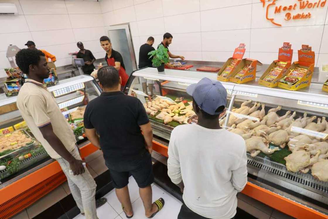 Tripoli residents shop for meat Tripoli residents shop for meat