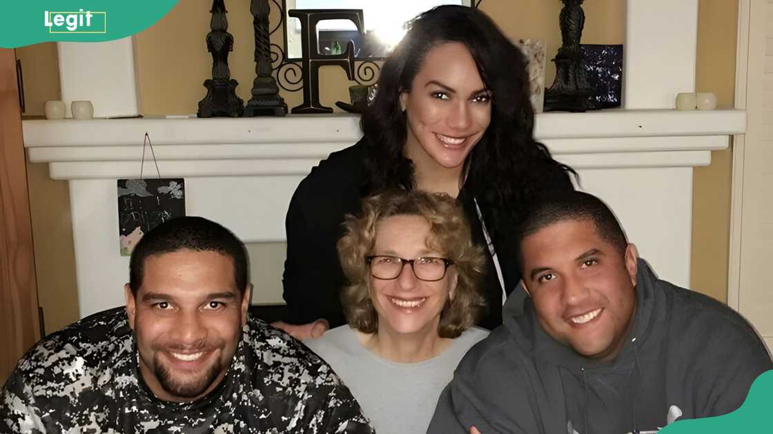 Wrestler Nia Jax (in black) with her mother and two brothers. Wrestler Nia Jax (in black) with her mother and two brothers.