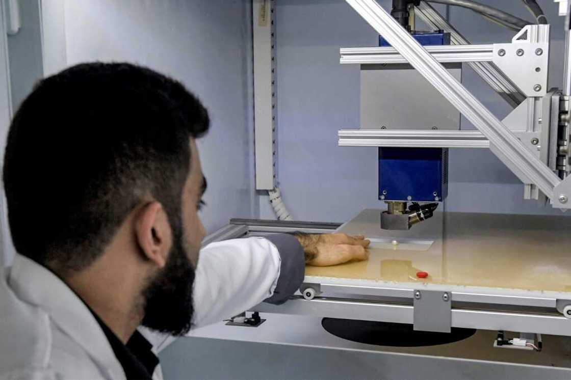 Gemologists in Manama look for 'growth lines' that distinguish natural pearls from cultured ones Gemologists in Manama look for 'growth lines' that distinguish natural pearls from cultured ones