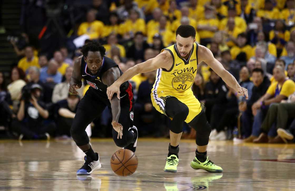 Patrick Beverley of the LA Clippers steals the ball from Stephen Curry of the Golden State Warriors at ORACLE Arena in Oakland, California Patrick Beverley of the LA Clippers steals the ball from Stephen Curry of the Golden State Warriors at ORACLE Arena in Oakland, California