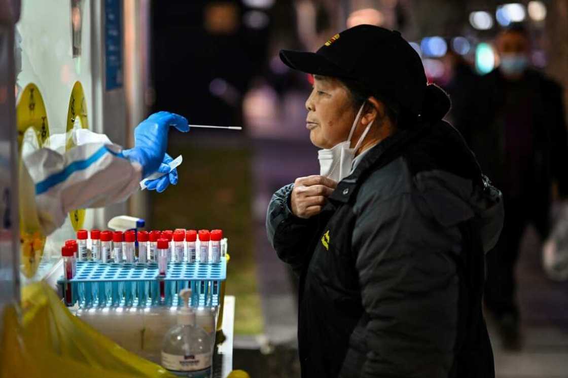 China's economy has been hammered by years of strict Covid containment measures including lockdowns and mass testing China's economy has been hammered by years of strict Covid containment measures including lockdowns and mass testing