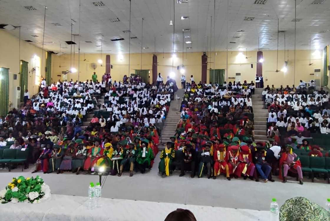 Students and staff sit during a university lecture Students and staff sit during a university lecture
