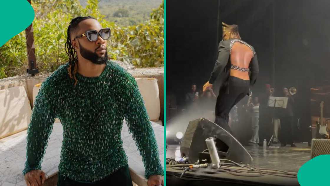 Flavour wears crop top, backless shirt at OVO Wembley concert. Flavour wears crop top, backless shirt at OVO Wembley concert.