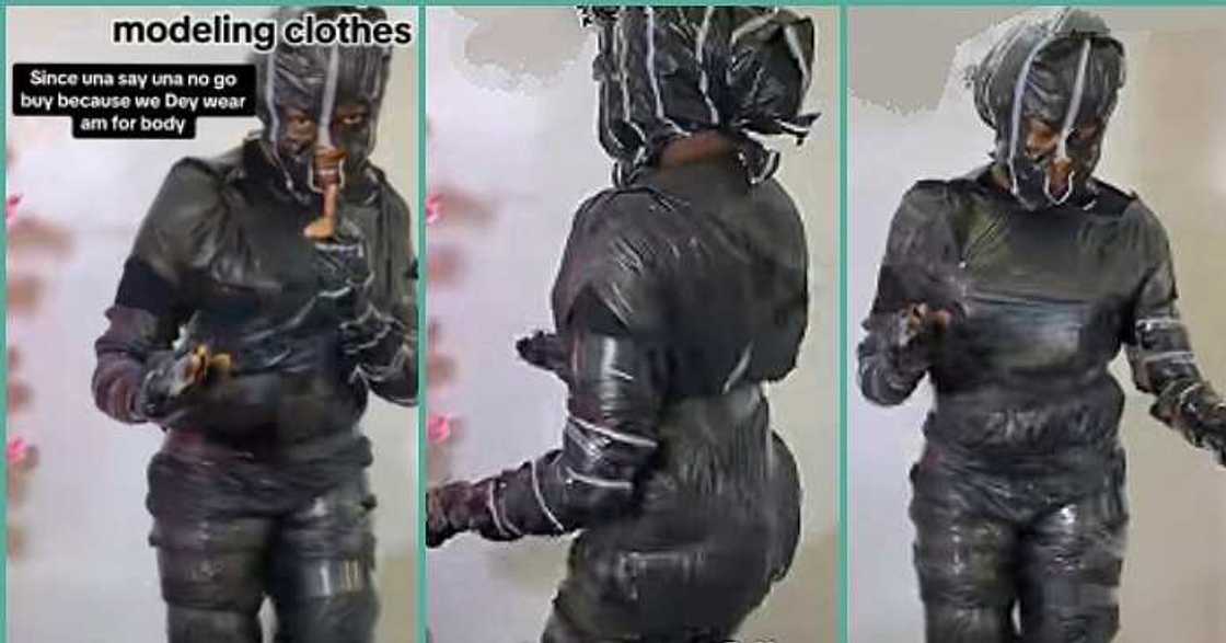 Thrift seller wraps herself with cellophane to model clothes Thrift seller wraps herself with cellophane to model clothes