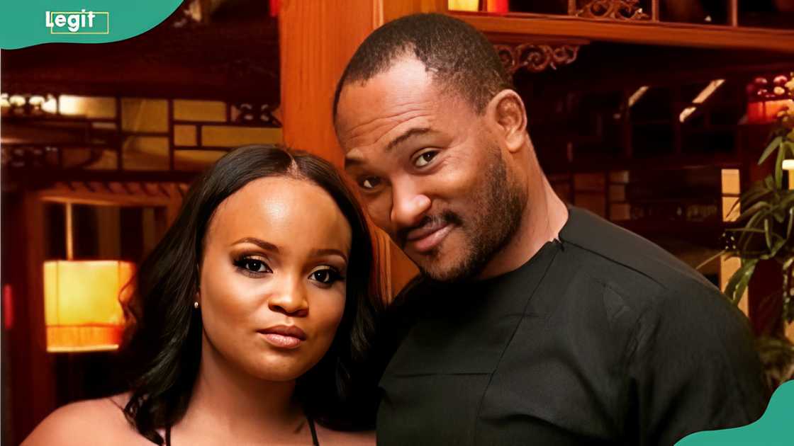 Maureen Esisi and her ex-husband Blossom Chukwujekwu posing for a photo in a restaurant Maureen Esisi and her ex-husband Blossom Chukwujekwu posing for a photo in a restaurant