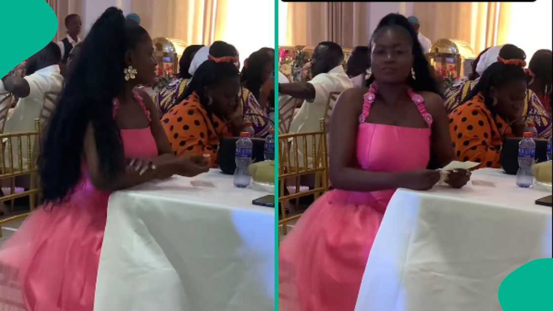Lady reads letter given to her by a man.