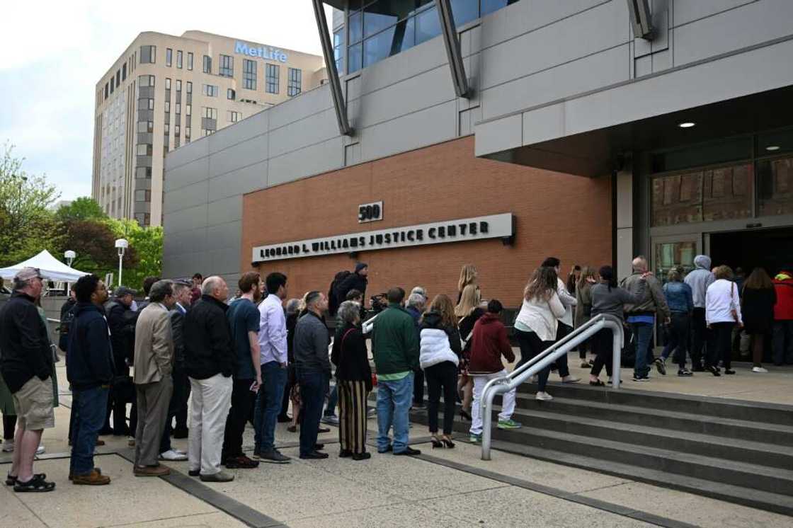Members of the public queue to enter a Delaware court to watch a major defamation trial between Dominion Voting Systems and Fox News on April 18, 2023 Members of the public queue to enter a Delaware court to watch a major defamation trial between Dominion Voting Systems and Fox News on April 18, 2023