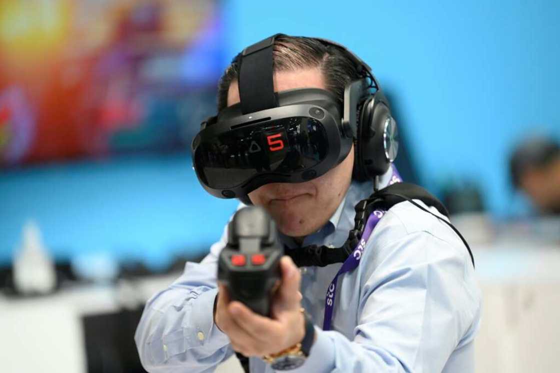 Taiwanese company HTC showed off its virtual reality headset at the Mobile World Congress (MWC), the telecom industry's biggest annual gathering, in Barcelona Taiwanese company HTC showed off its virtual reality headset at the Mobile World Congress (MWC), the telecom industry's biggest annual gathering, in Barcelona