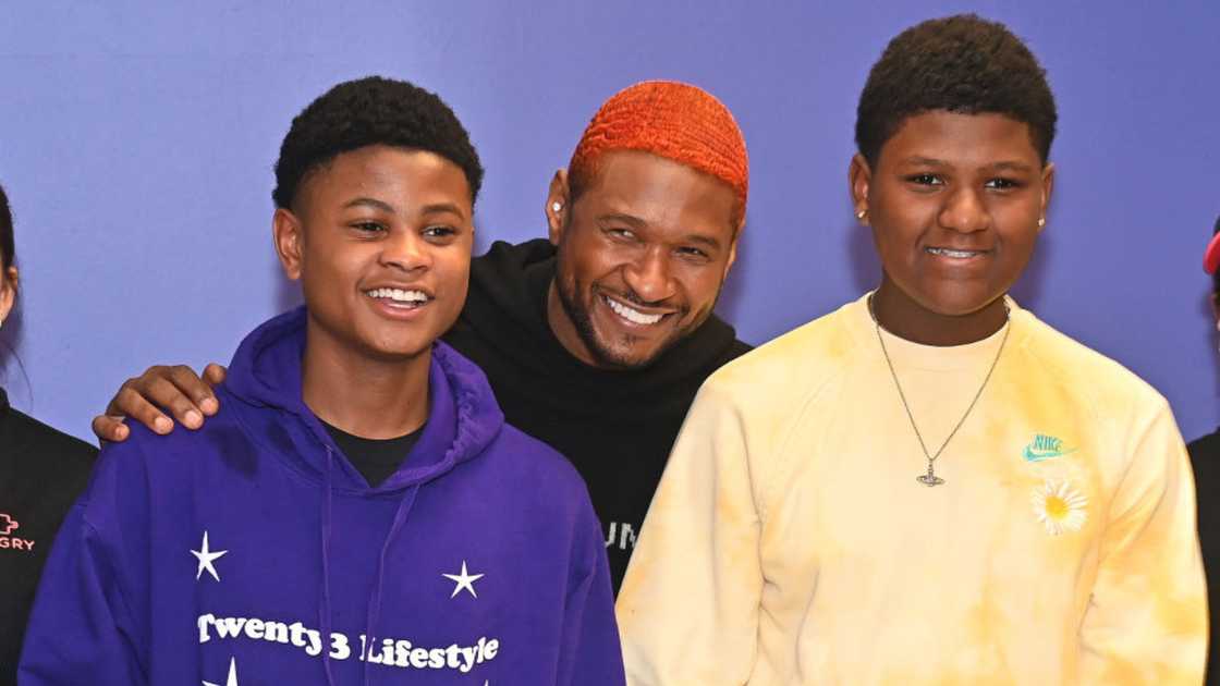 Usher Raymond and his sons Usher "Cinco" Raymond V and Naviyd Raymond in Sandy Springs, Georgia. Usher Raymond and his sons Usher "Cinco" Raymond V and Naviyd Raymond in Sandy Springs, Georgia.