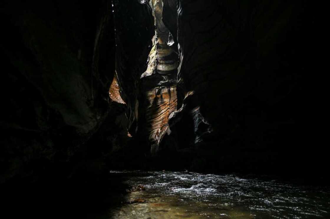 Rays of sunlight illuminate parts of the deep canyon in La Uribe Rays of sunlight illuminate parts of the deep canyon in La Uribe