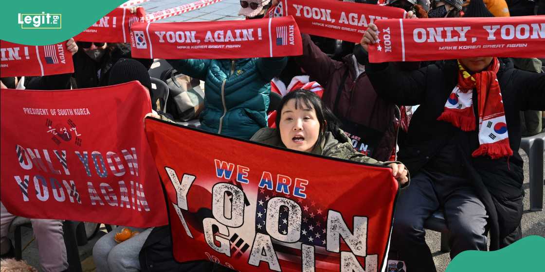 Security forces intervened after a protester attacked a television cameraman during post-verdict unrest.