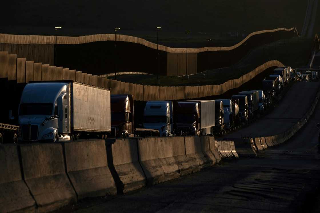 US President Donald Trump's tariffs on Canada, Mexico and China, and the retaliation they attracted, could dent US GDP growth notably if kept in place over a year US President Donald Trump's tariffs on Canada, Mexico and China, and the retaliation they attracted, could dent US GDP growth notably if kept in place over a year