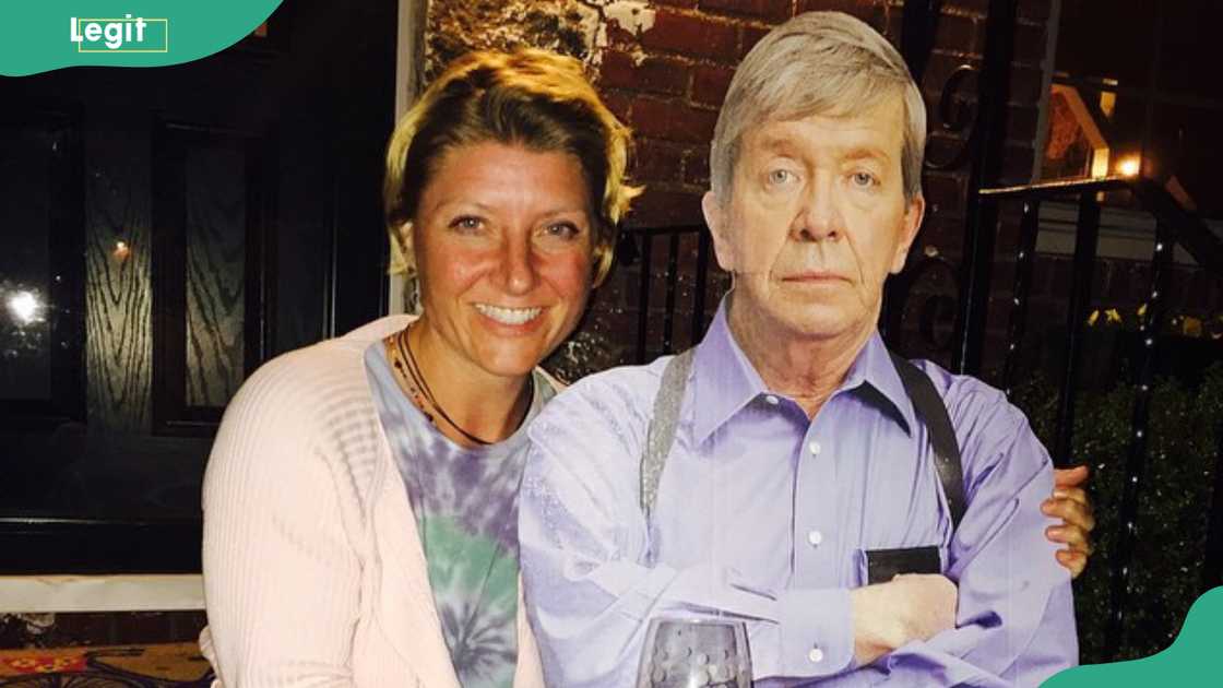 Joe Kenda's wife, Mary Kathleen Mohler, smiling warmly while sitting beside him