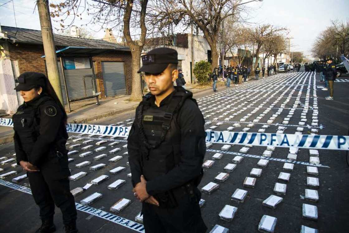 Argentine federal police officers guard cocaine packets seized in the city of Rosario Argentine federal police officers guard cocaine packets seized in the city of Rosario