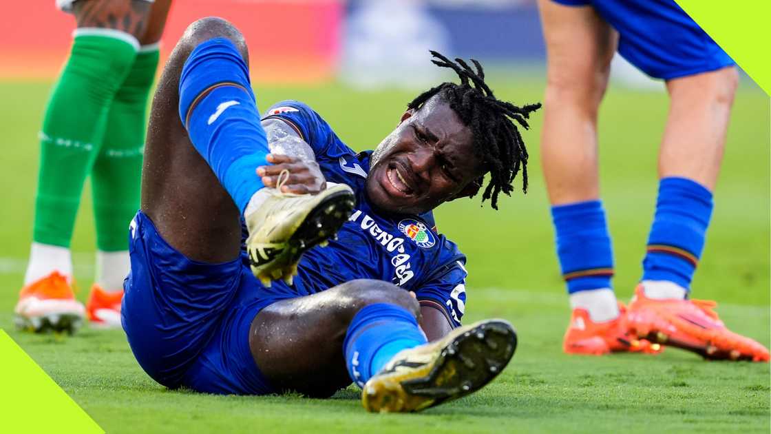 Getafe's Chrisantus Uche is fouled against Real Betis