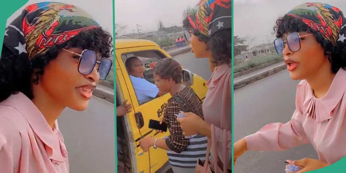 Nigerian lady flagging a bus. Nigerian lady flagging a bus.