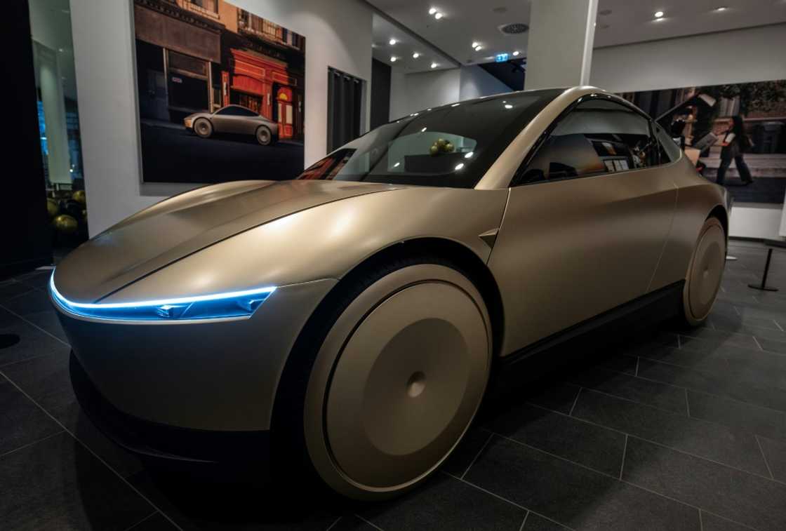 A prototype of US car manufacturer Tesla's self-driving electric Cybercab is seen in Tesla's showroom in a Berlin Mall on November 20, 2024