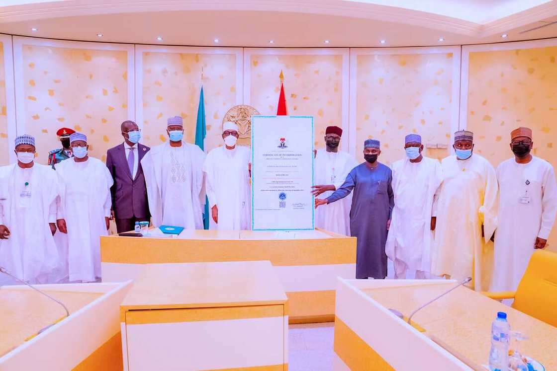 Buhari Receives certificate of incorporation for NNPC Buhari Receives certificate of incorporation for NNPC