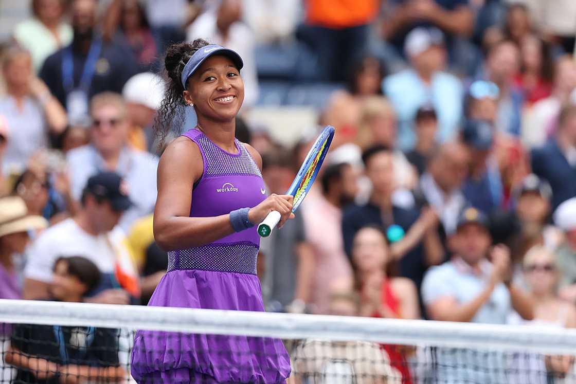 Naomi Osaka of Japan celebrates after defeating Coco Gauff