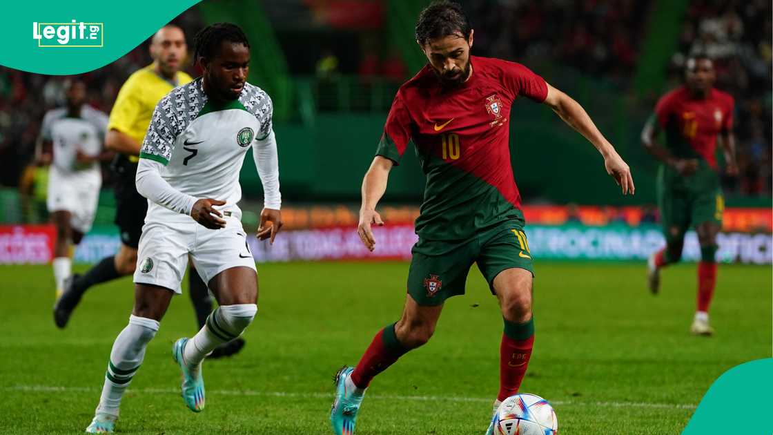 Bernardo Silva in action against Ademola Lookman during the international friendly match between Portugal and Nigeria in 2022. Photo by Gualter Fatia