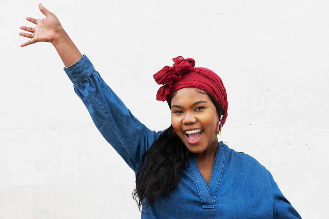 A woman waving A woman waving