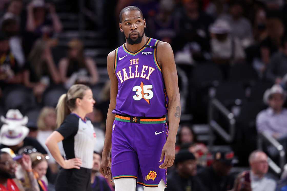 Kevin Durant of the Phoenix Suns looks on during a match Kevin Durant of the Phoenix Suns looks on during a match